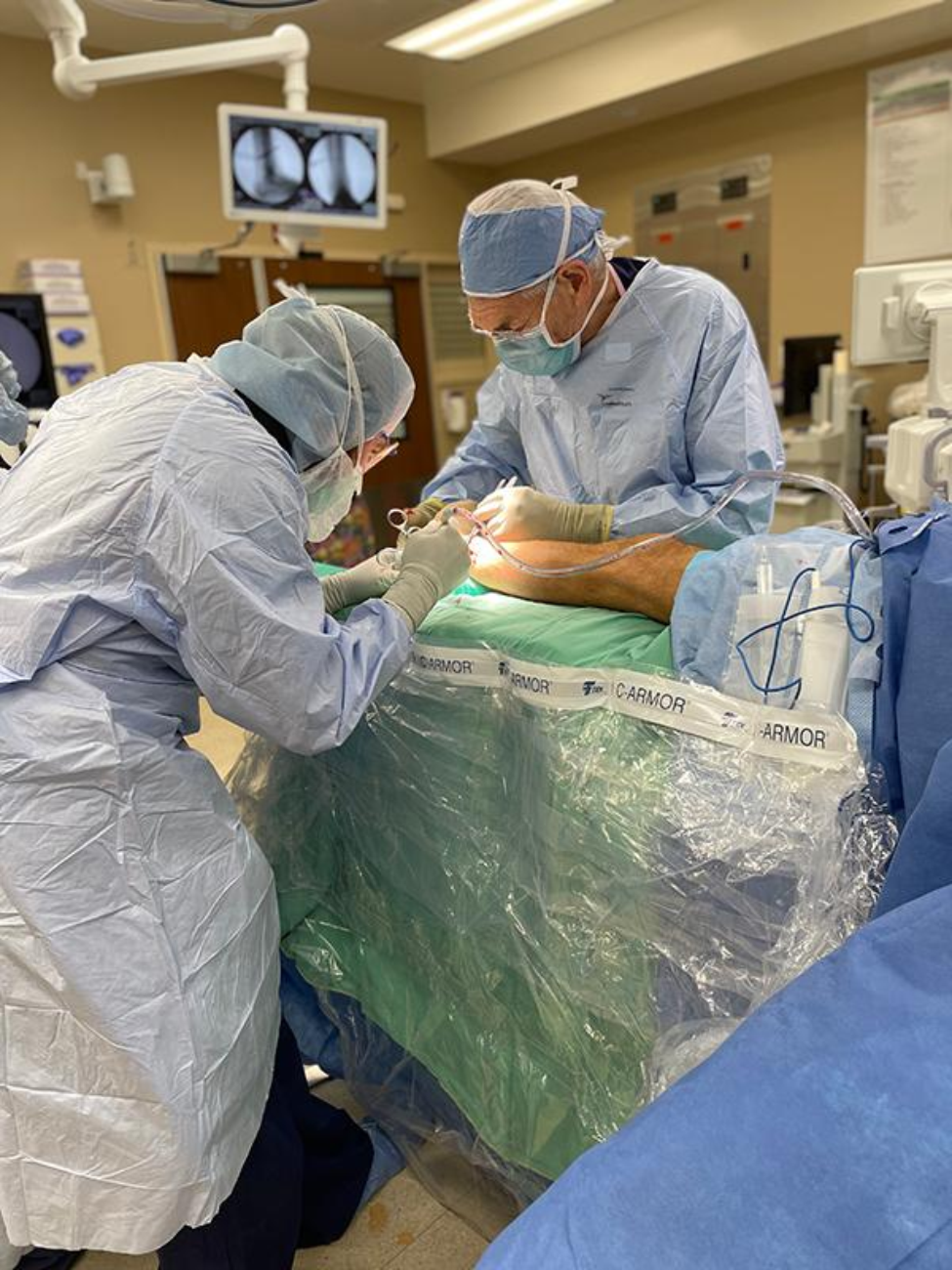 Patrick Kellam (front left) and James Kellam (back right) fix an ankle fracture. (Photo courtesy of Patrick Kellam)